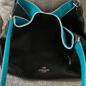 Authentic Coach Black genuine leather Teal interior